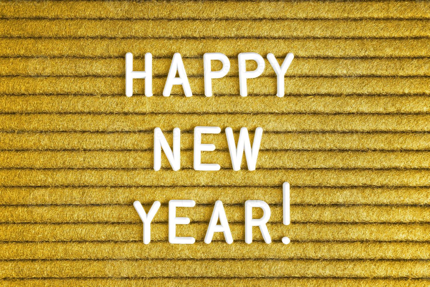 gott nytt år, text på gul filtbokstavstavla med vita bokstäver foto