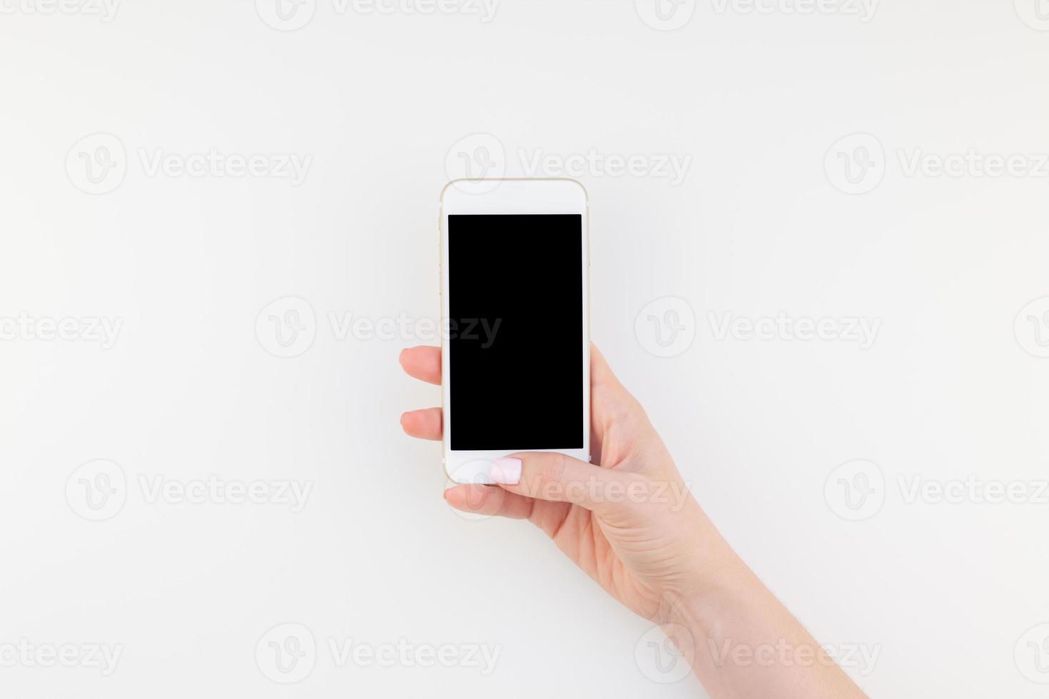 kvinna hand med smartphone mock up foto