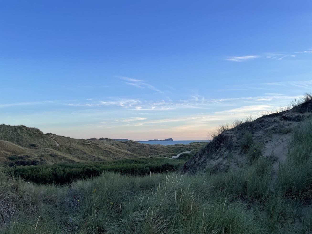 maskhuvud, rhossili bay gower uk foto