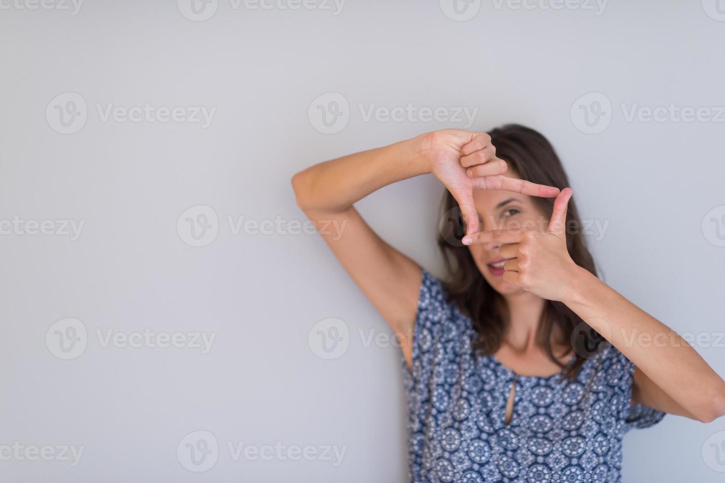 kvinna visar inramning hand gest foto