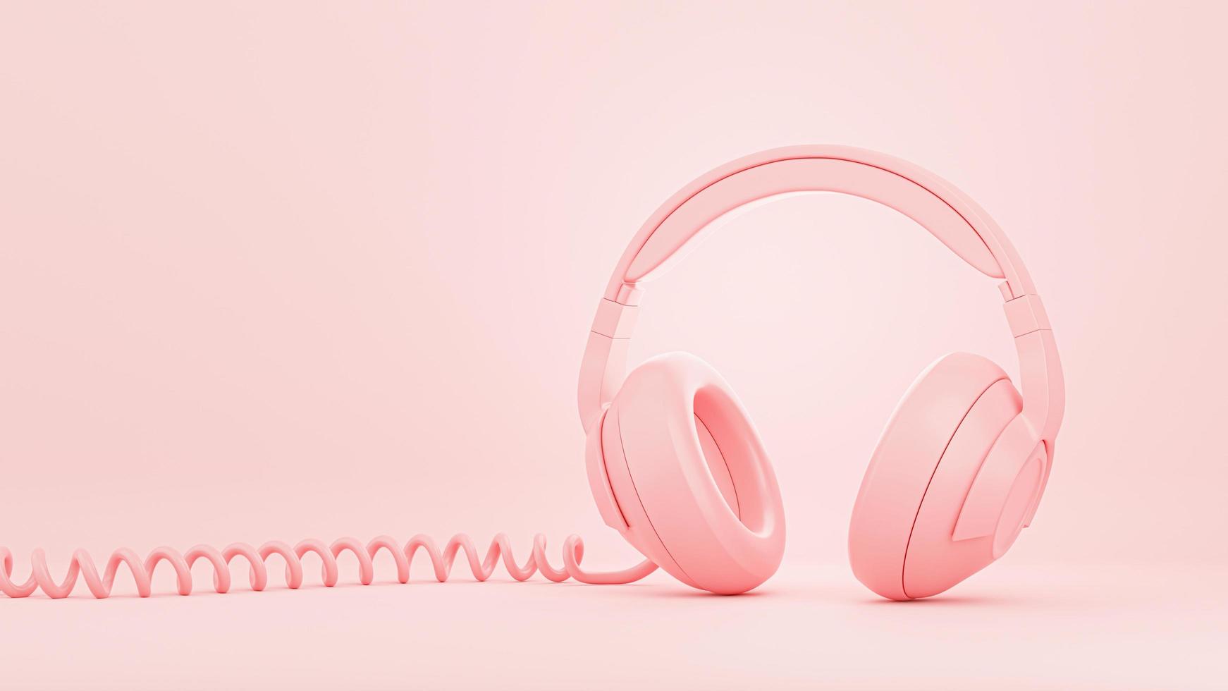 3D gör av rosa hörlurar på rosa bakgrund foto