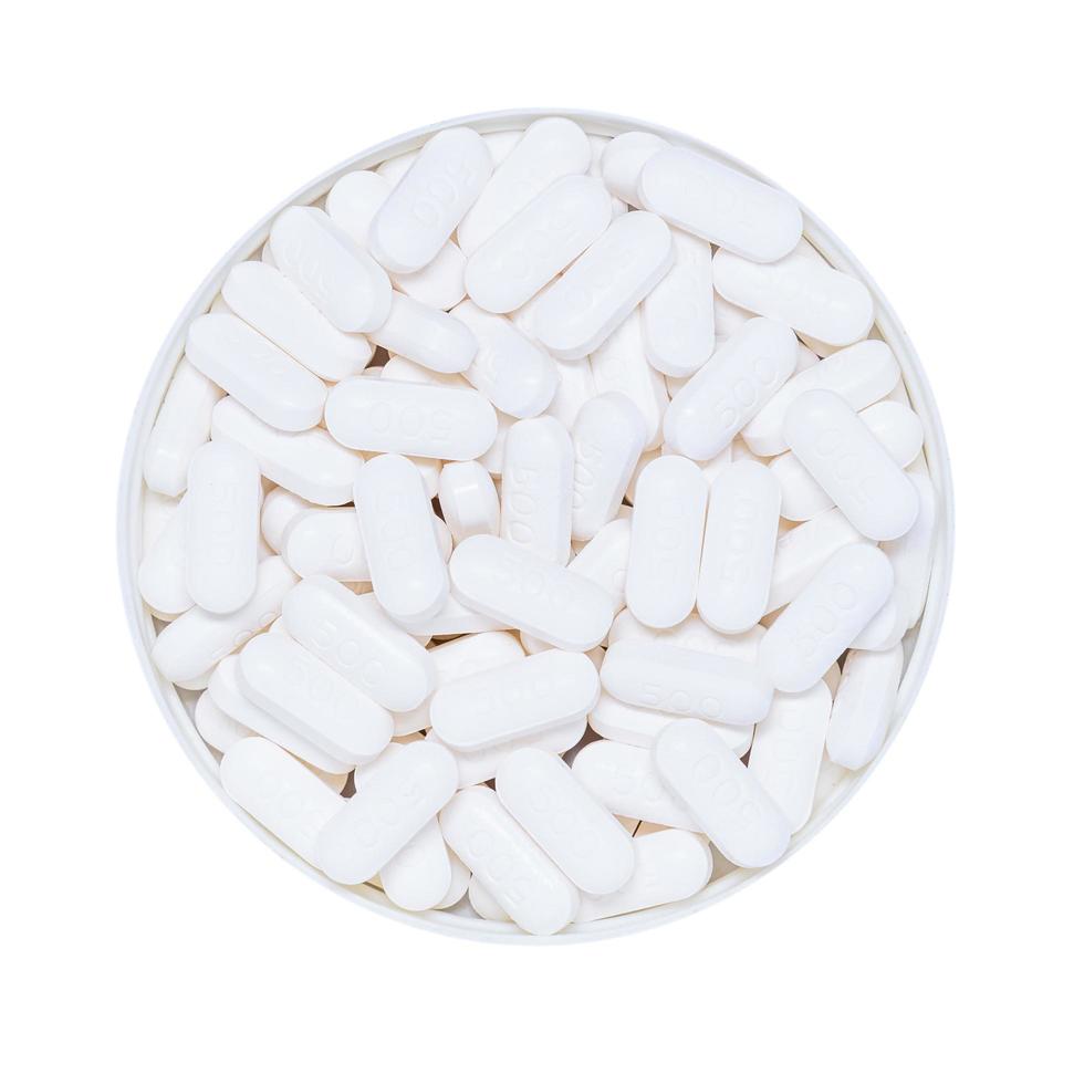 piller i piller flasklock isolerad på vit bakgrund foto