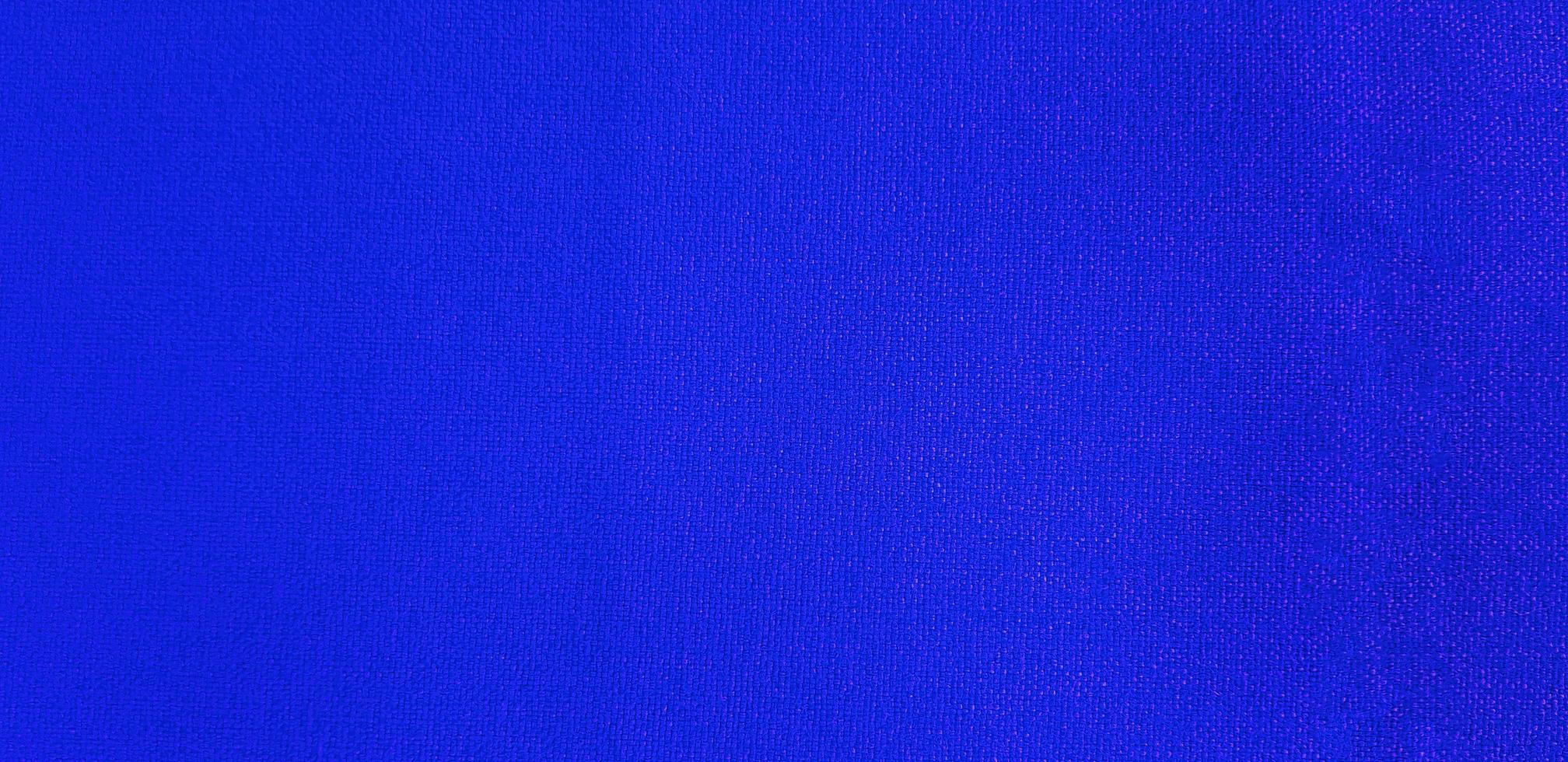 texturerad av blå soffa yta för bakgrund eller tapet. mjuk material och mönster begrepp foto