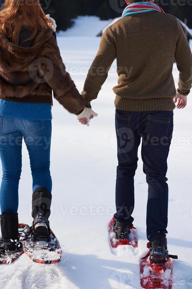 par att ha kul och gå i snöskor foto