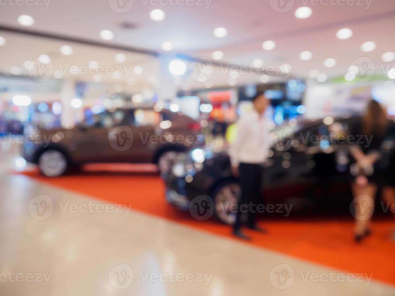 bil showroom oskärpa för bakgrund foto