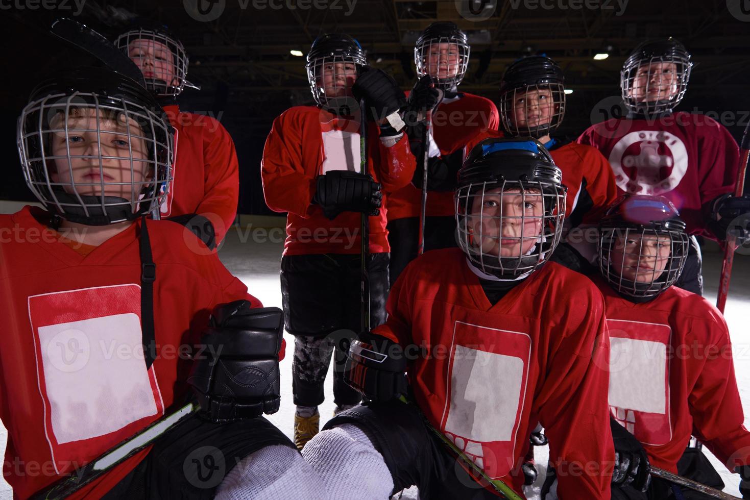 Lycklig barn grupp hockey team sport spelare foto