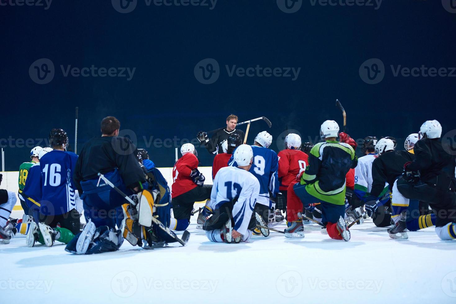 is hockey spelare team möte med tränare foto