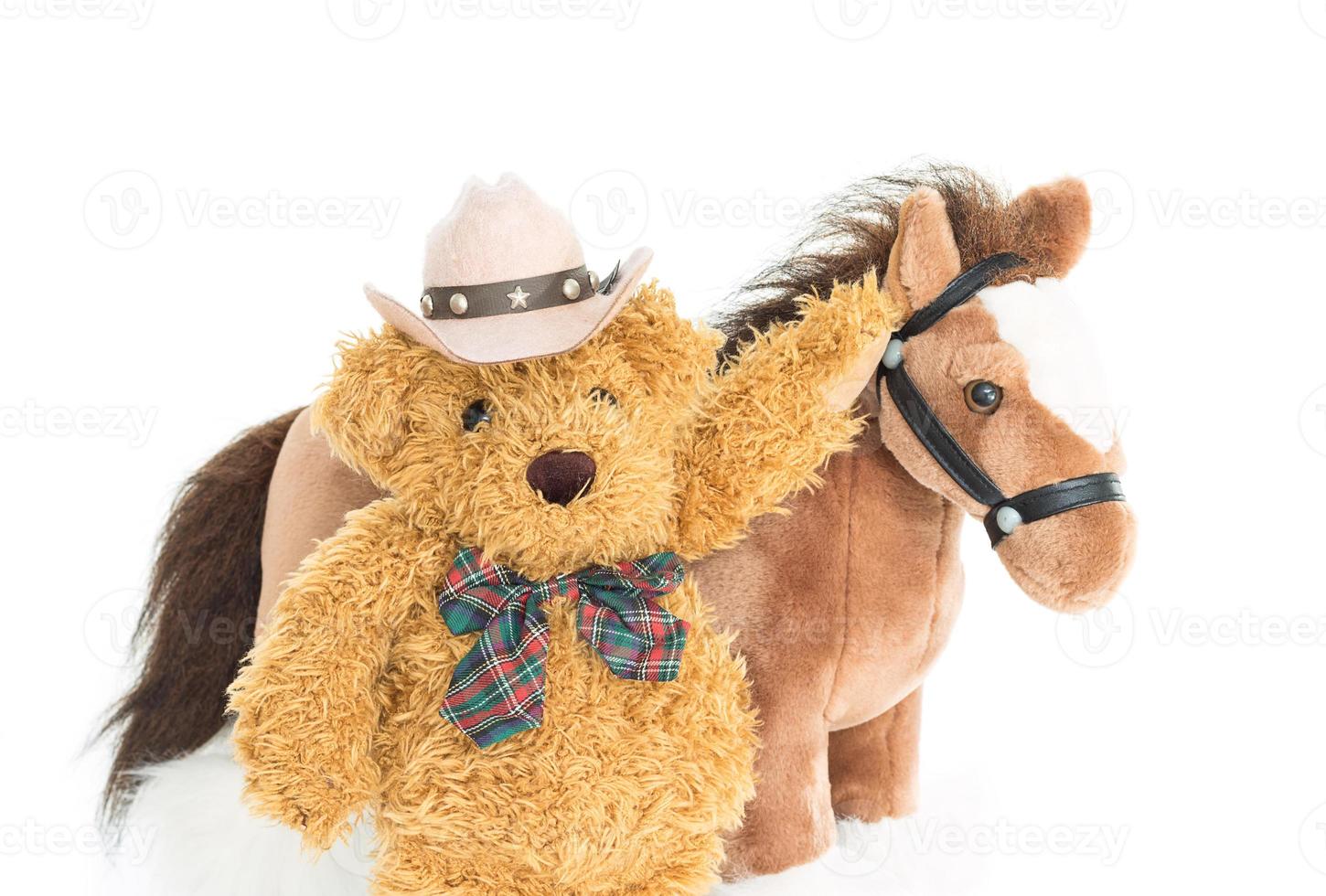 cowboy nallebjörn och hästar foto