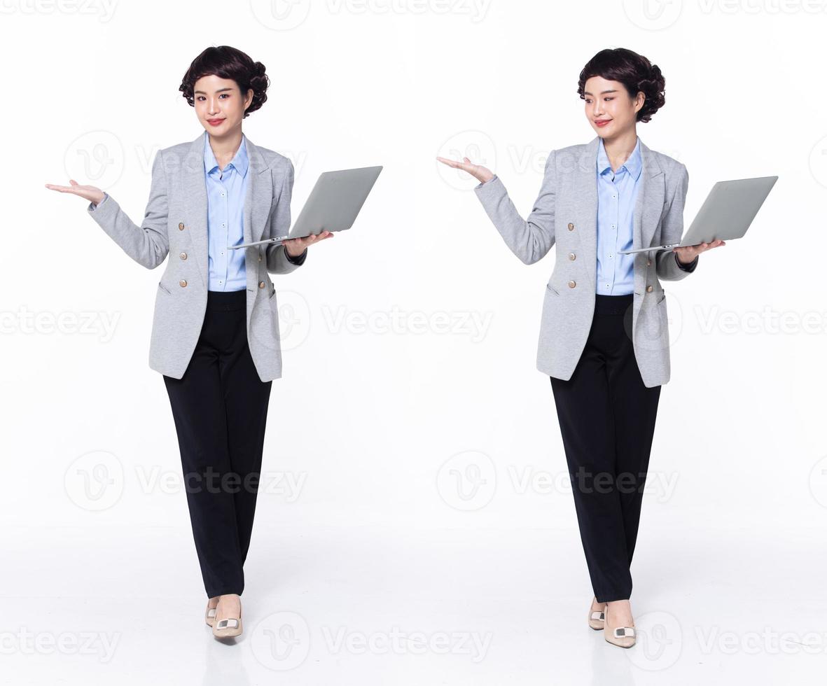 full längd 30s 40s asiatisk kvinna lärare chef företag, som visar tömma handflatan hand foto