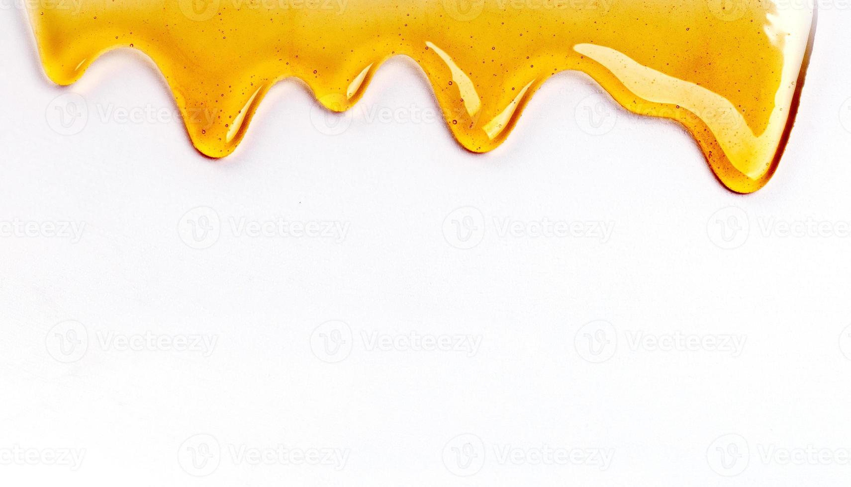 droppande honung sömlöst repeterbar från de topp över vit med copy och text foto