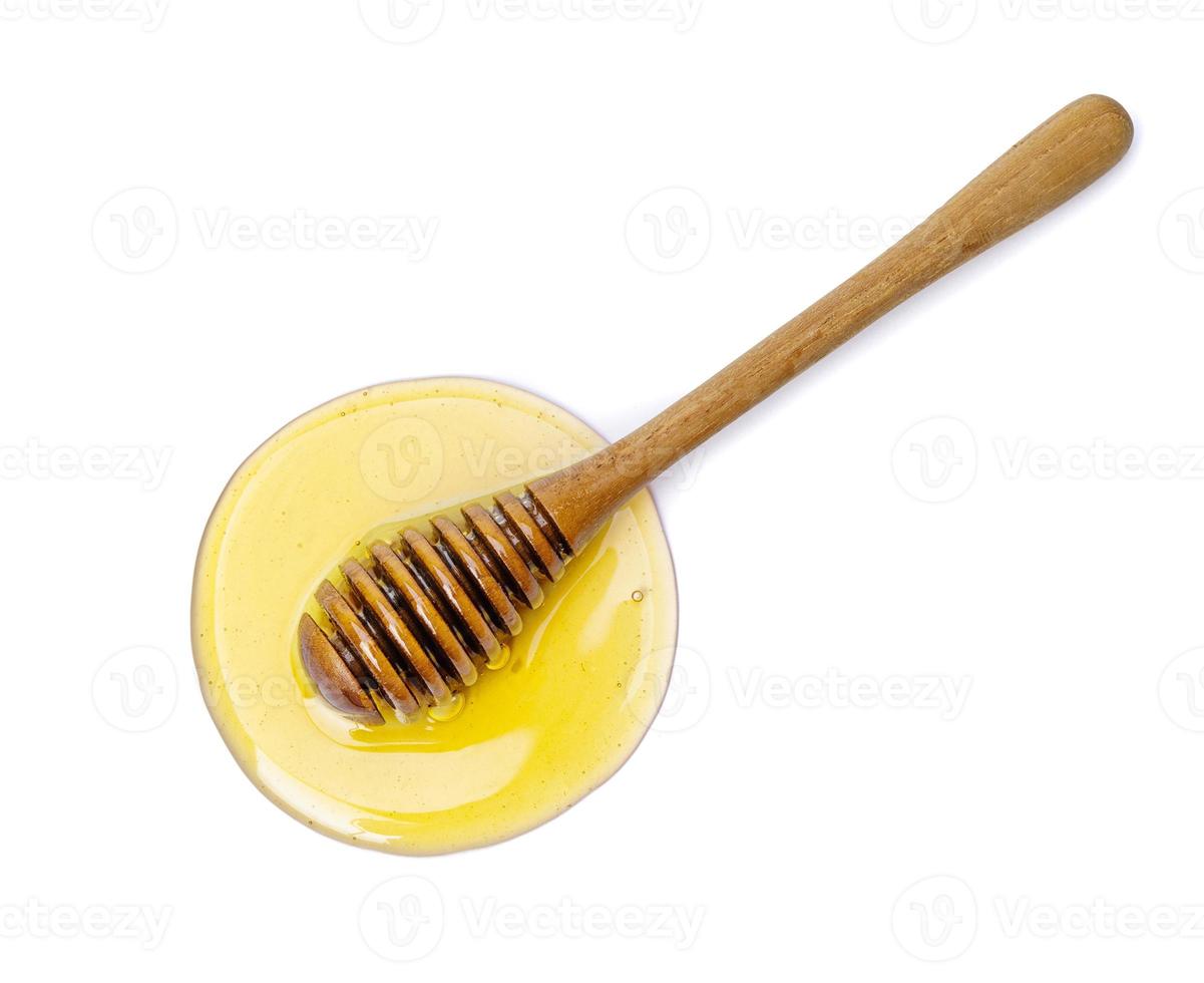 honung bi med honung dipper och blomma isolera på vit bakgrund, bi Produkter förbi organisk naturlig Ingredienser begrepp foto