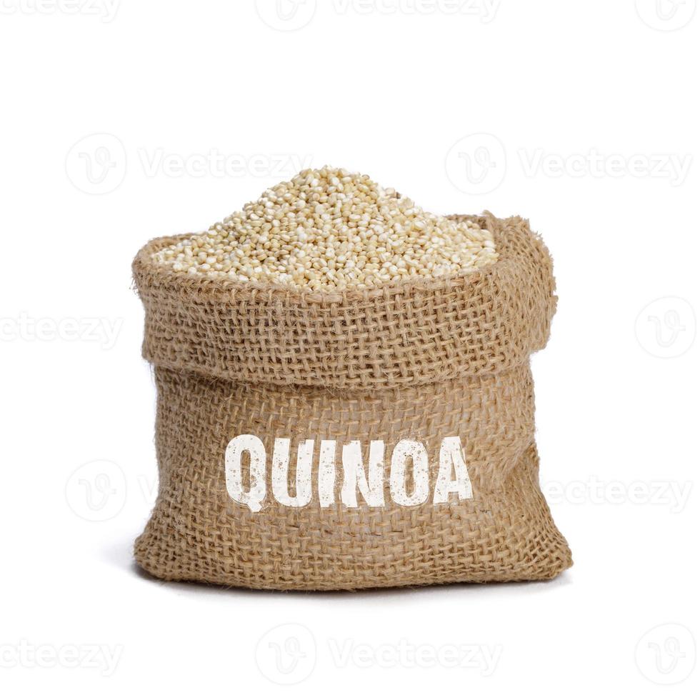 vit frön av quinoa i de trasa säck, friska mat vanor och begrepp av balanserad diet foto