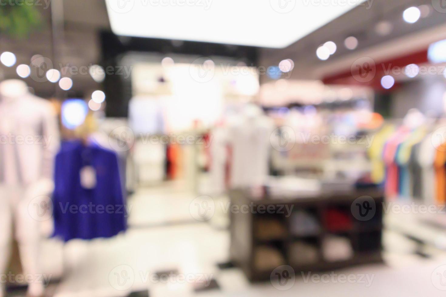 abstrakt oskärpa kläder boutique visa interiör av köpcentrum bakgrund foto