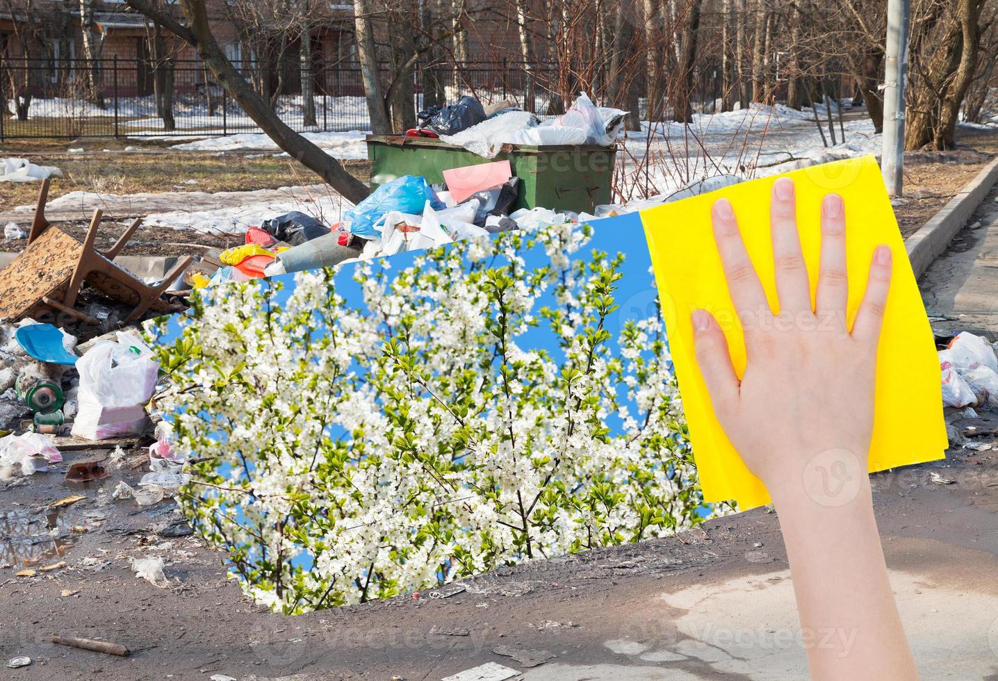 hand raderar urban skräp förbi gul trasa foto