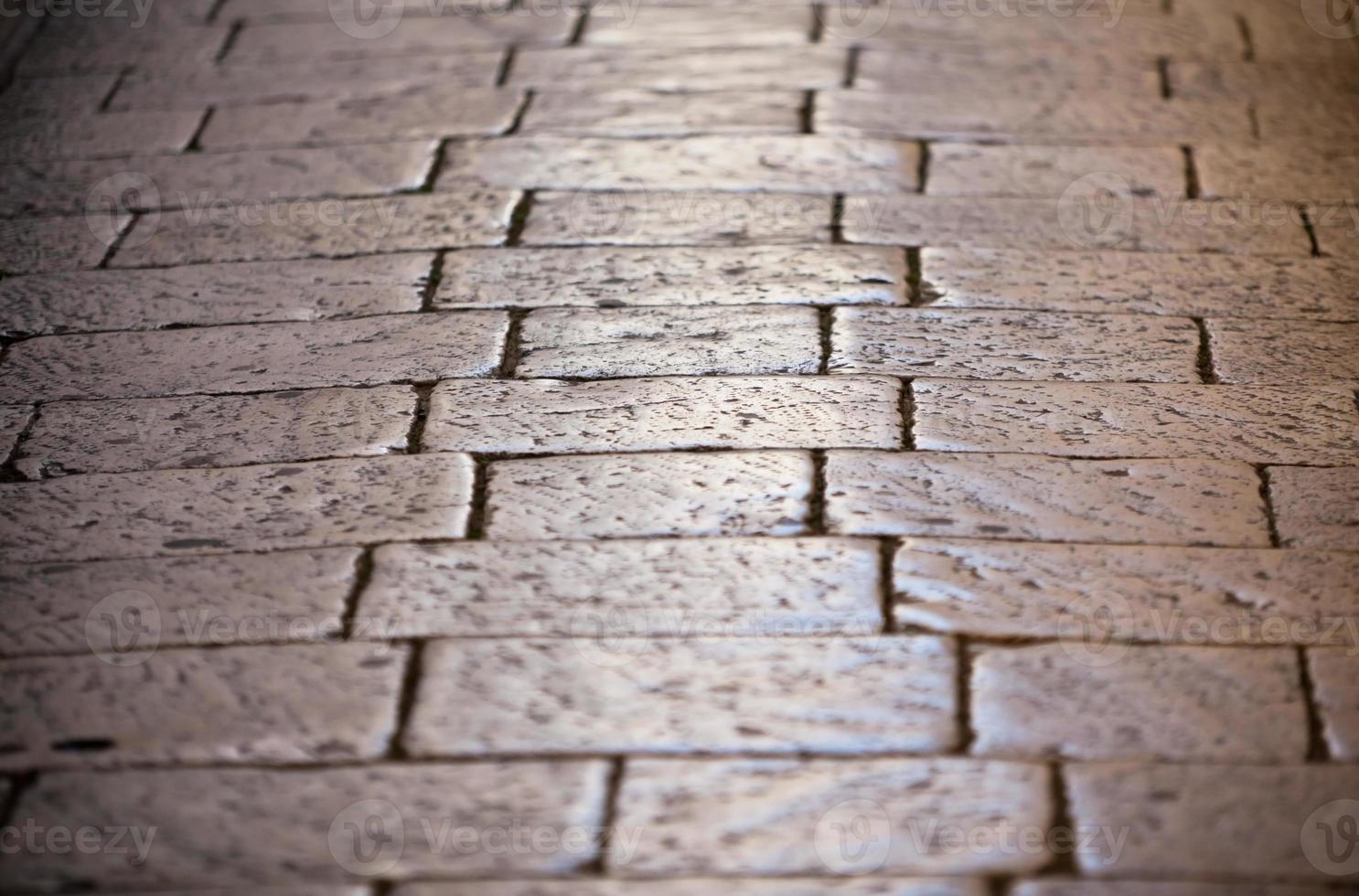 kullersten trottoar stänga upp bakgrund foto