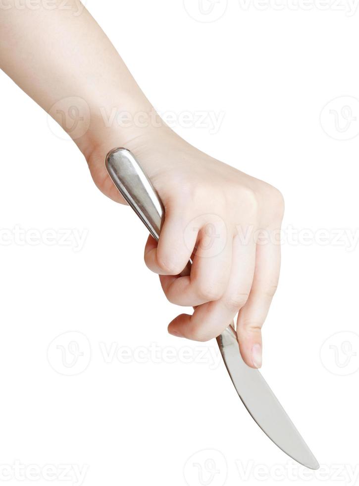 kvinna hand med tabell kniv isolerat foto