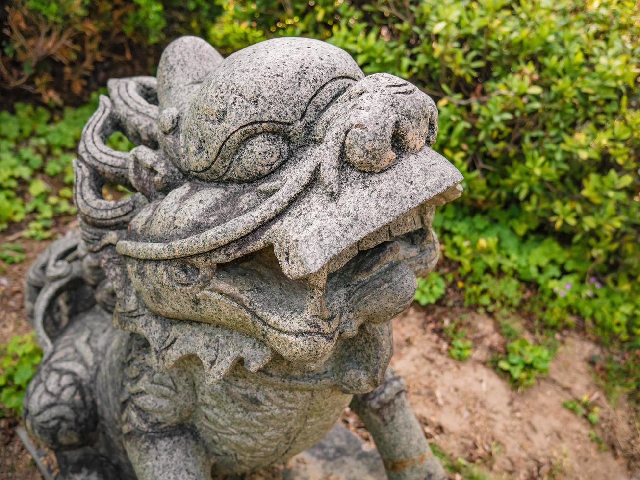 lejon staty i songdafeng zushi minnesmärke hall eller tai hong kong i teochew språk på shantou stad guangdong provins Kina. foto