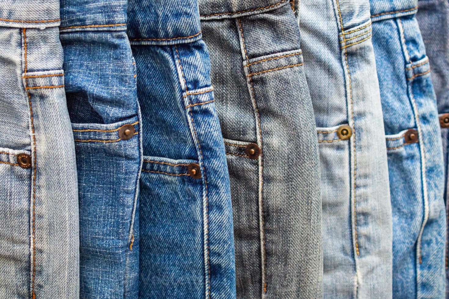 denim blå jeans stack textur bakgrund närbild foto