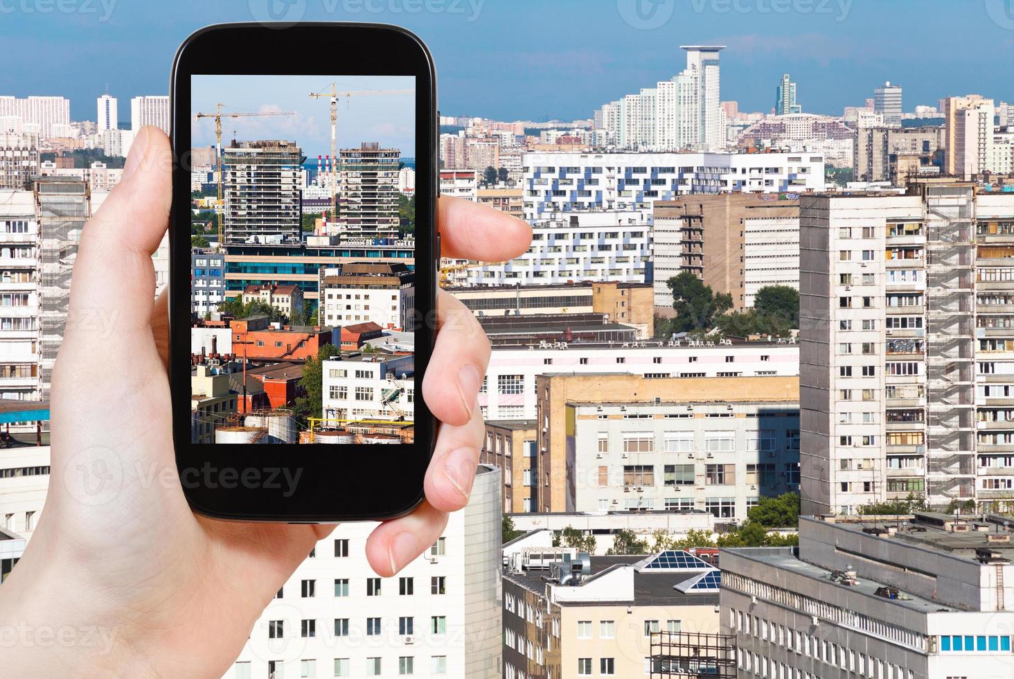 turist fotografier av hus i moskva stad foto