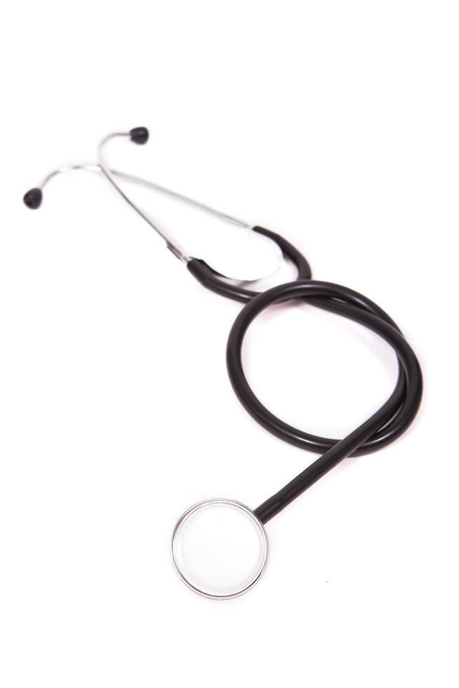 medicinskt stetoskop på en vit bakgrund foto