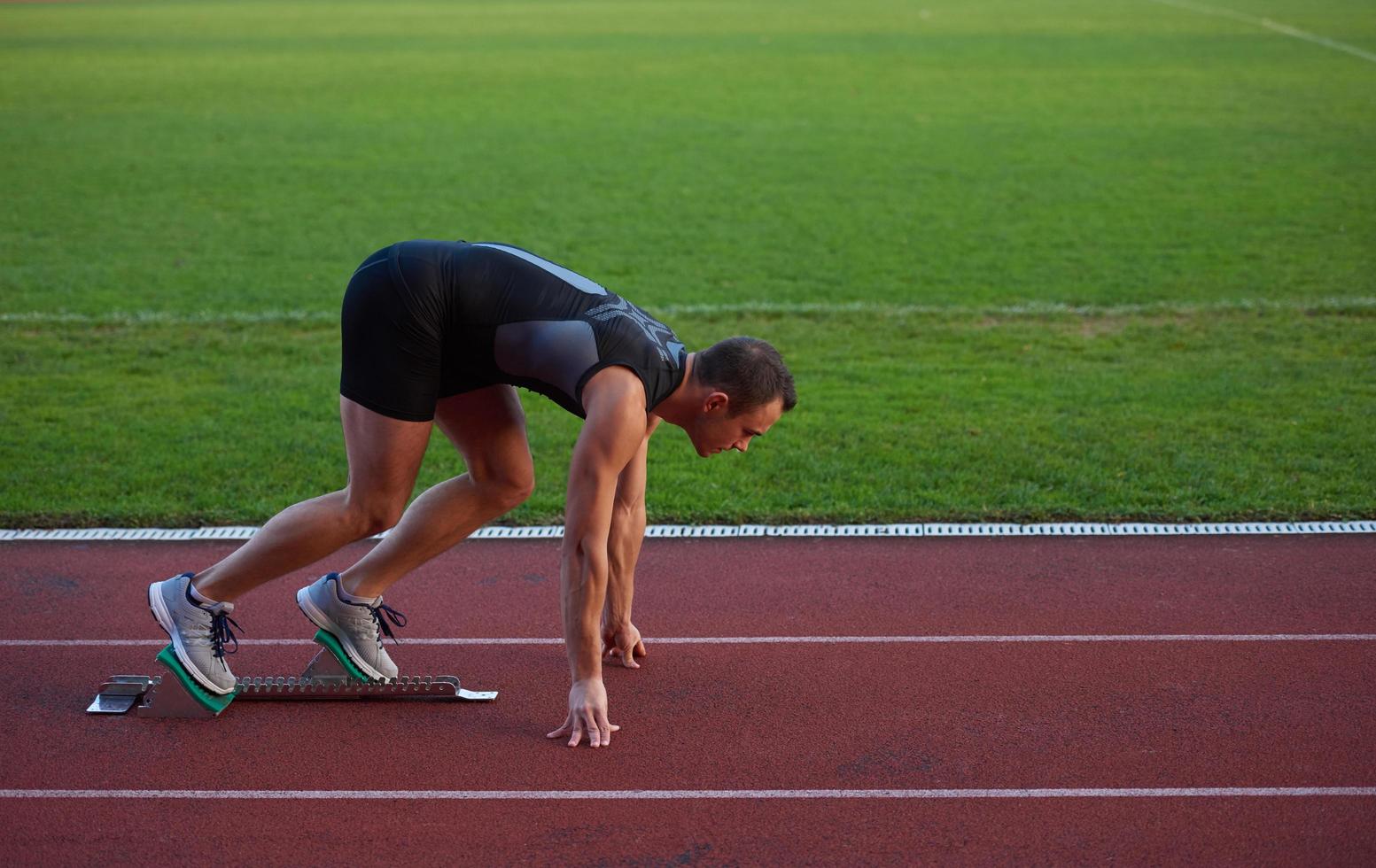 atletisk man Start foto