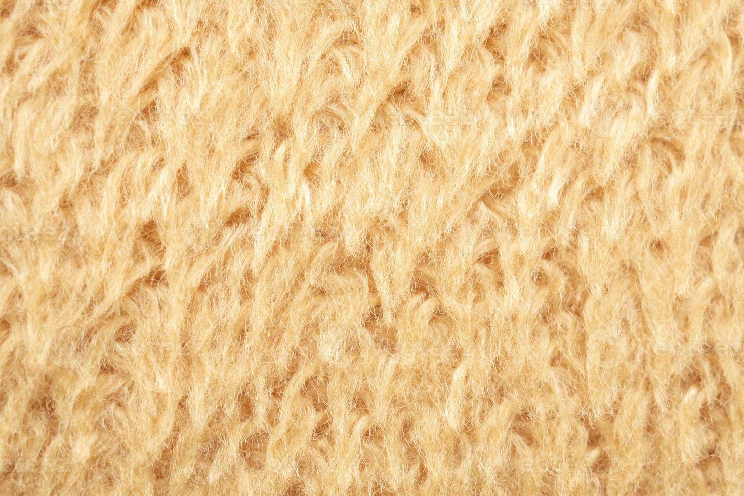 gul fluffig päls tyg ull textur bakgrund foto