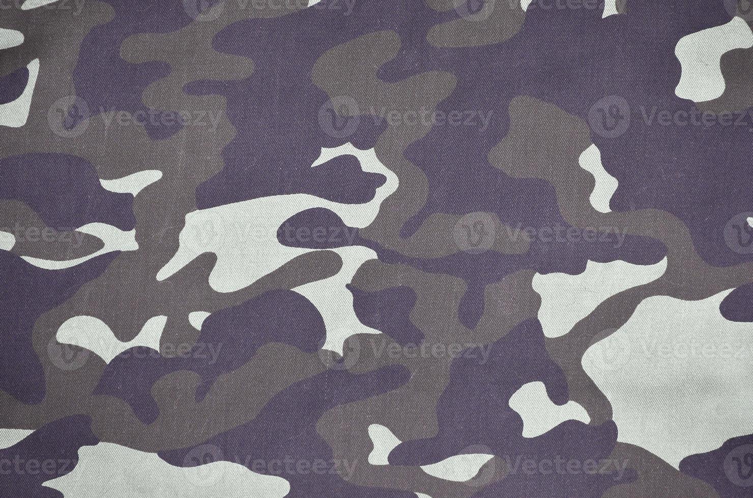 textur av tyg med en kamouflage målad i färger av de kärr. armén bakgrund bild foto