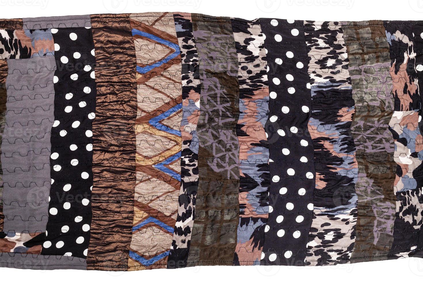 fragment av brun patchwork scarf isolerat foto