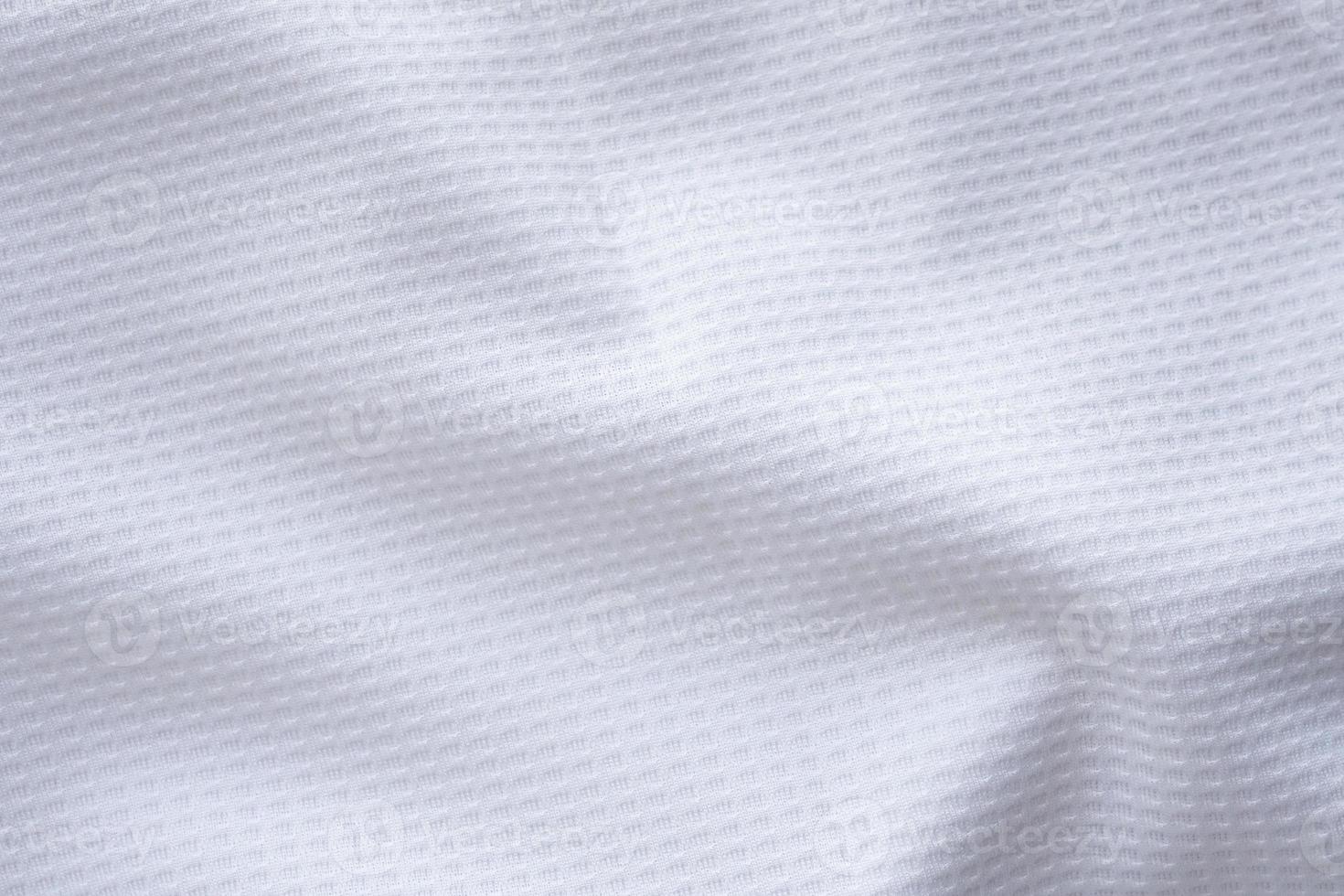 vit sporter Kläder tyg fotboll skjorta jersey textur abstrakt bakgrund foto