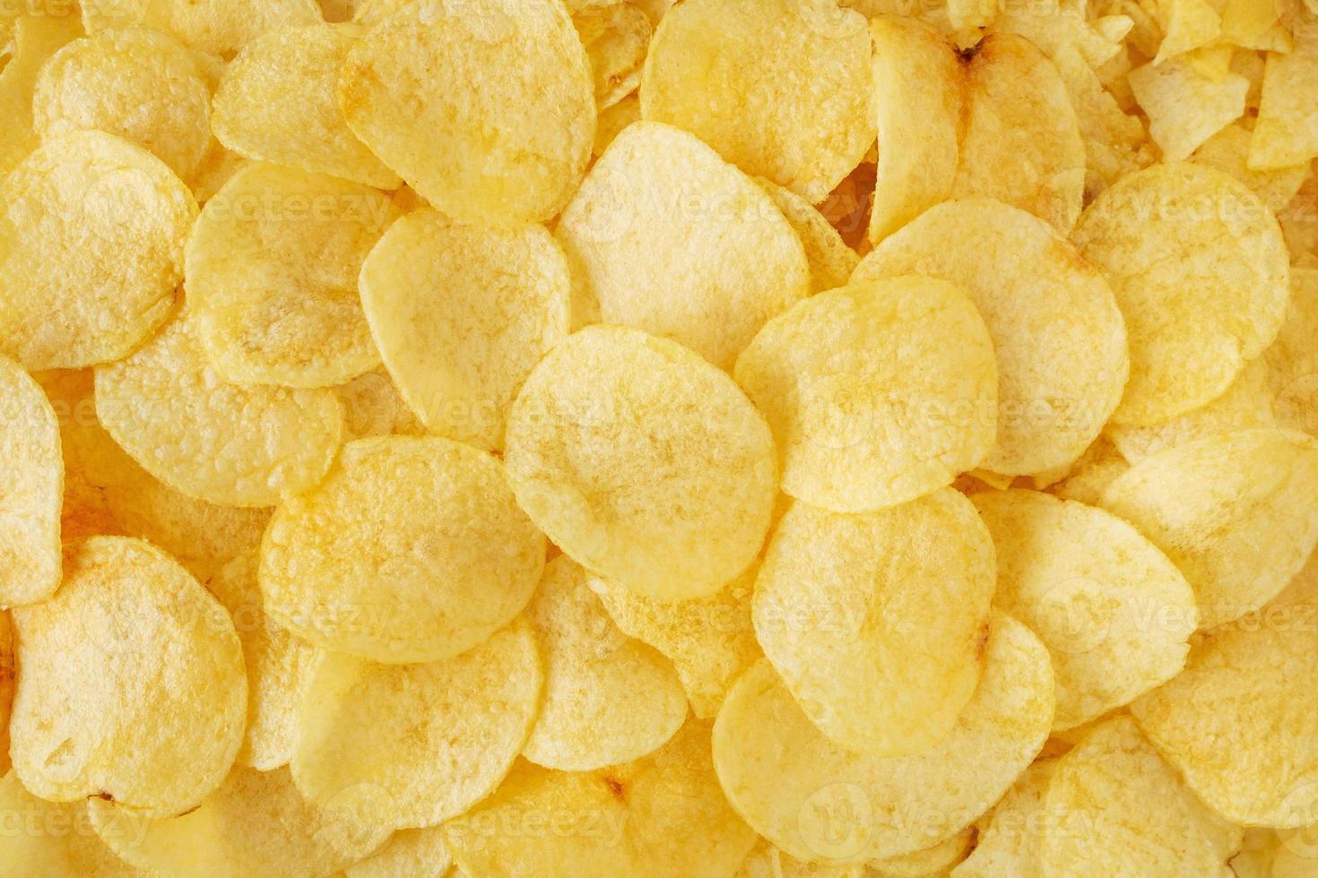 krispiga potatischips snack textur bakgrund ovanifrån foto