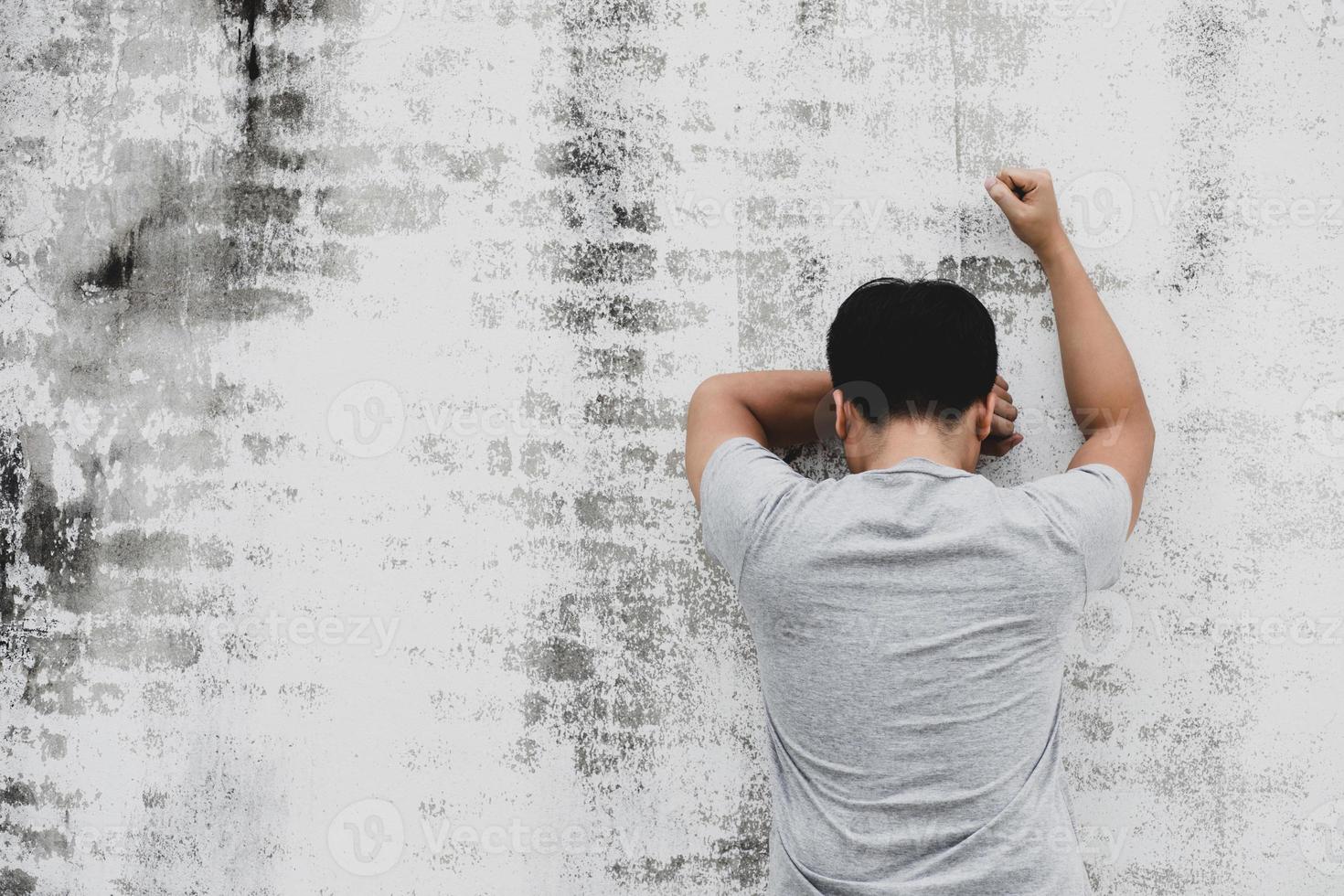 betonade man lidande från depression foto