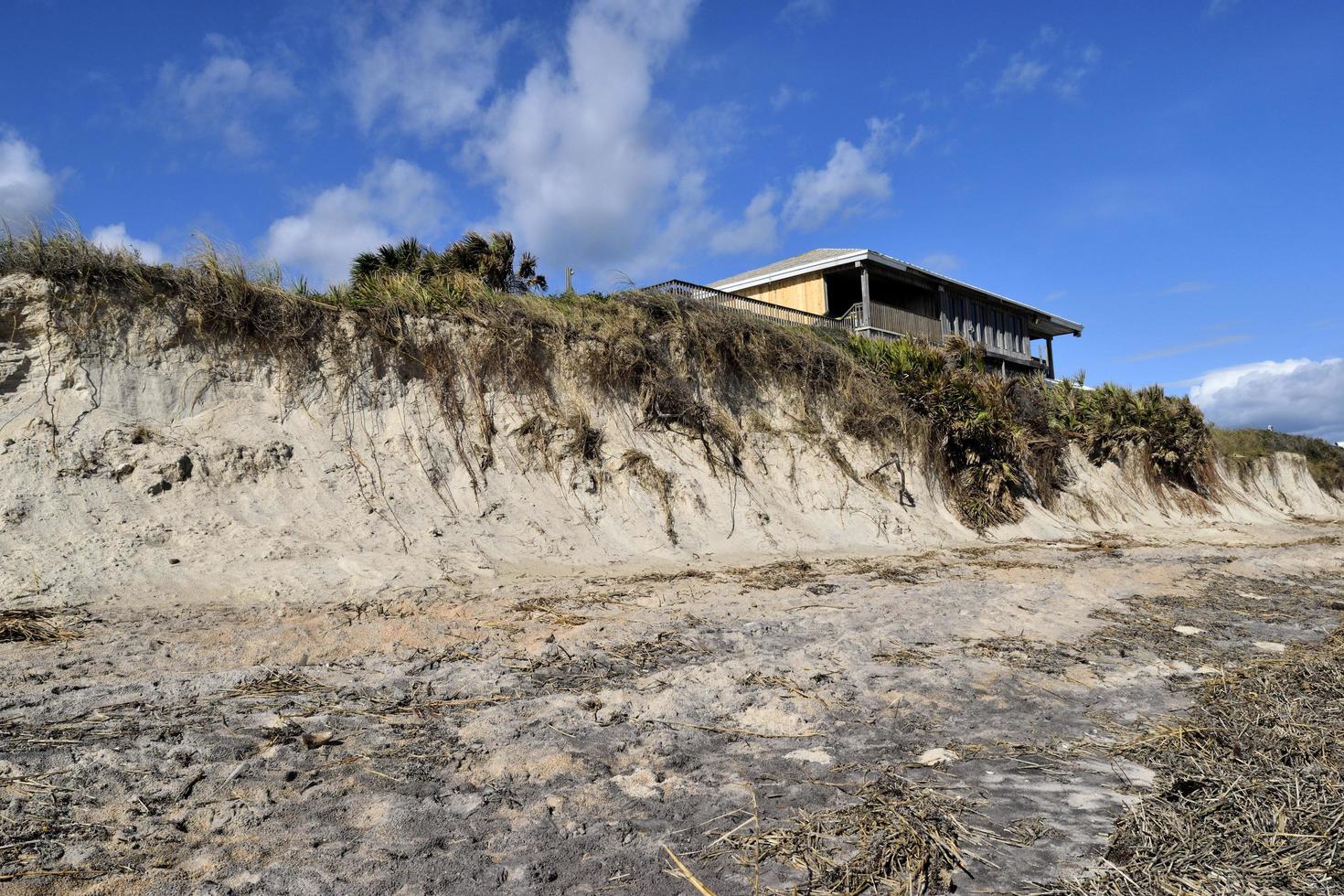 stranderosion efter orkanmatteus foto