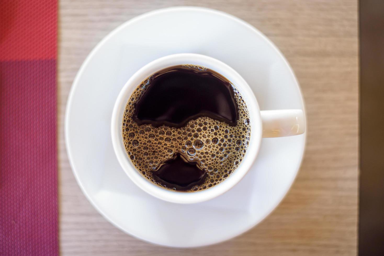 ovanifrån av kopp svart svart kaffe foto