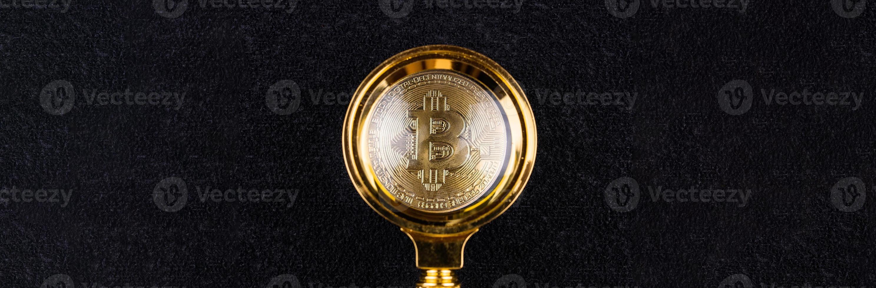 bitcoin under de förstorande glas foto