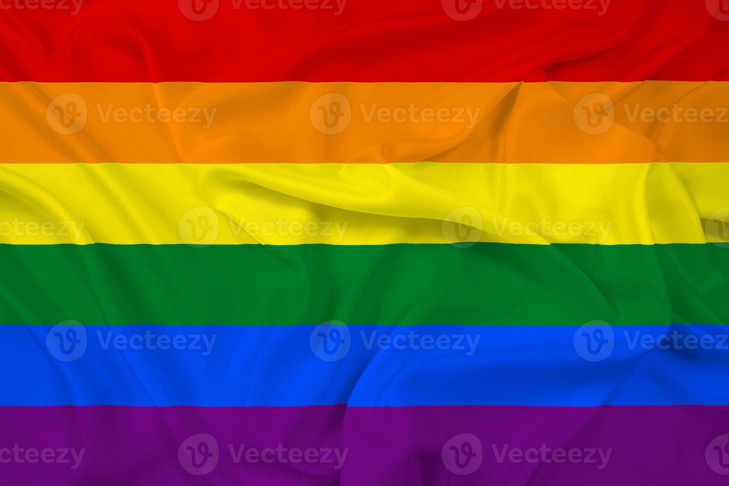 viftande regnbågsflagga foto
