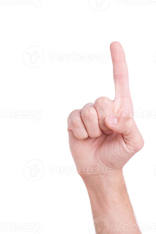 händer pekande upp. närbild av manlig hand med finger upp och isolerat på vit foto