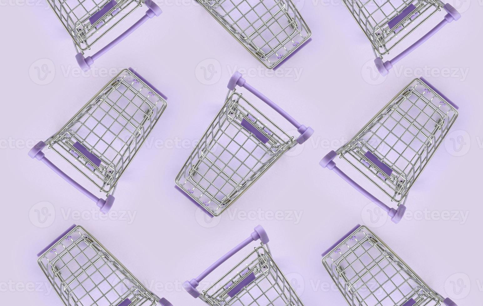 mönster av många små handla kärror på en violett bakgrund. minimalism platt lägga topp se foto