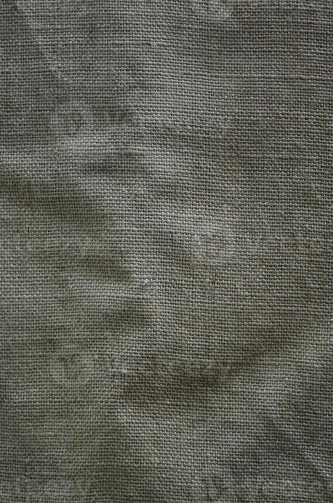 de textur av en mycket gammal brun säck trasa. retro textur med duk material. bakgrund bild med kopia Plats foto