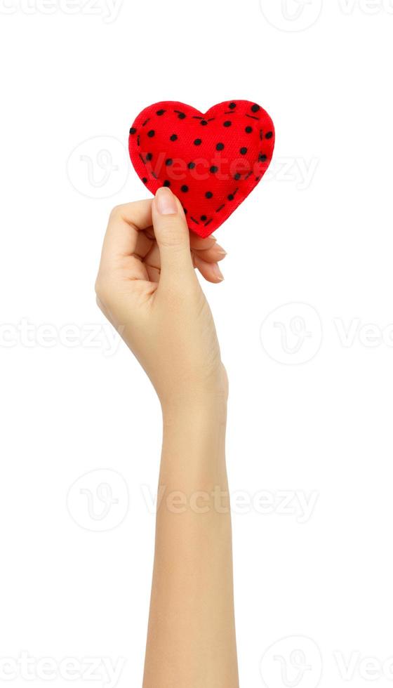 hand innehav de hjärta isolerat på vit bakgrund foto