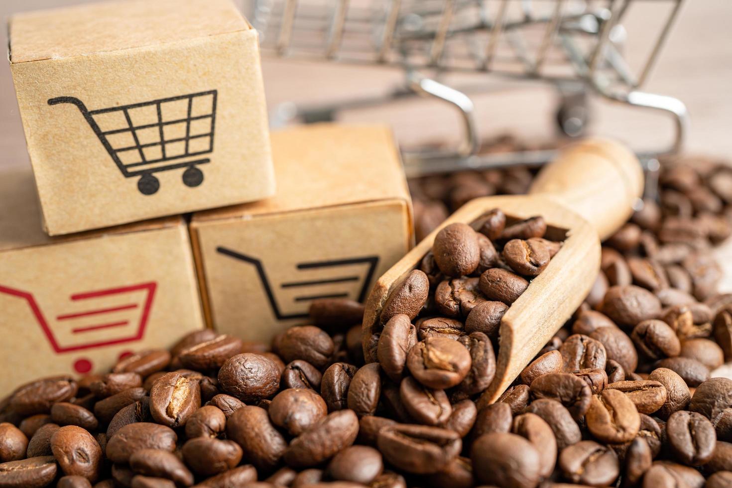 låda med kundvagn logotyp symbol på kaffebönor, importera export shopping online eller e-handel leverans service butik produkt frakt, handel, leverantörskoncept. foto