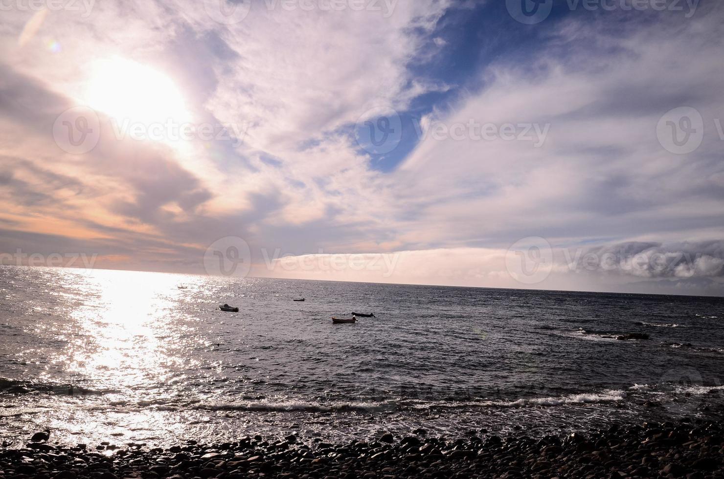 solnedgång över havet foto