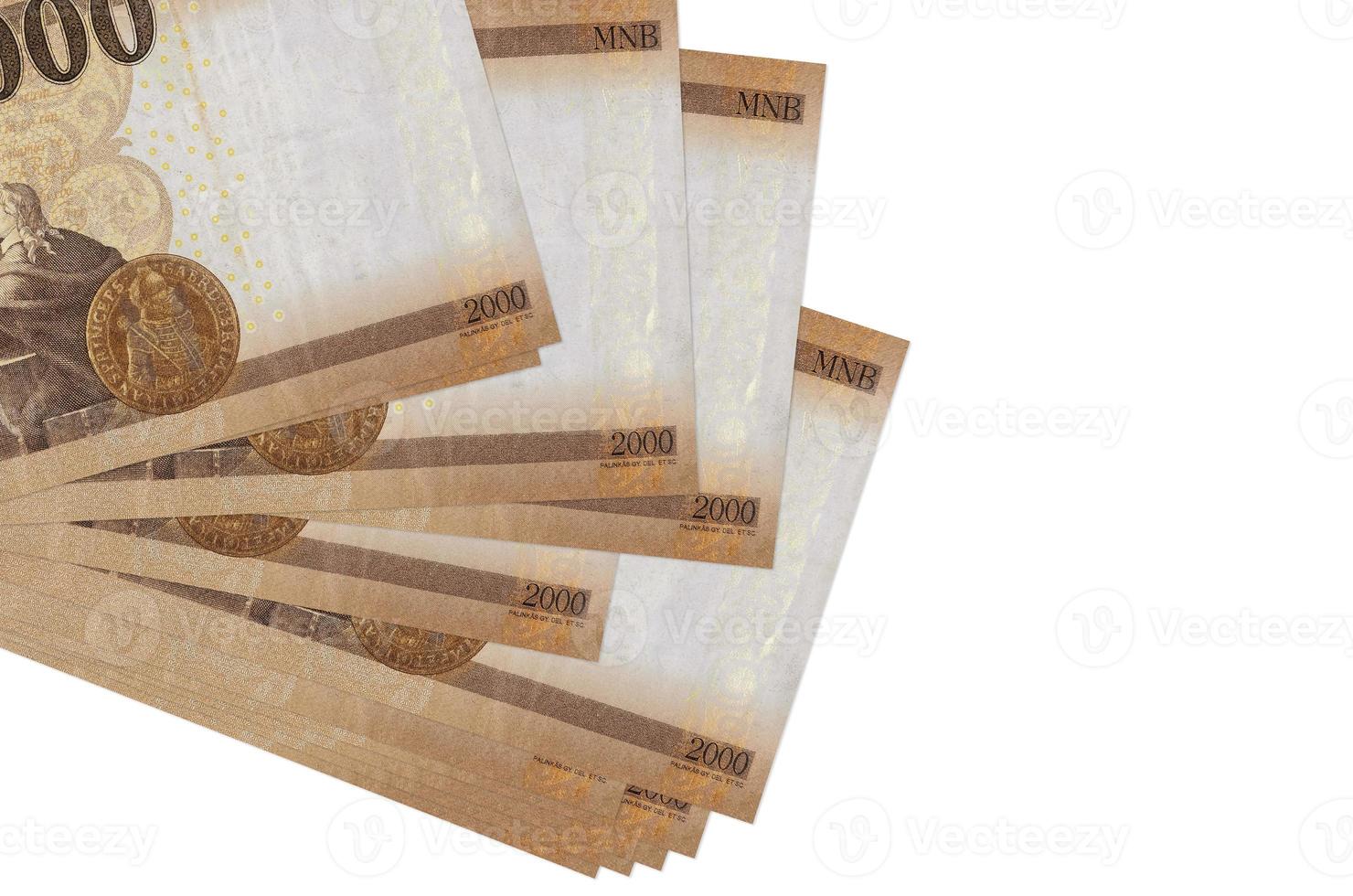 2000 ungerska forint räkningar lögner i små knippa eller packa isolerat på vit. attrapp med kopia Plats. företag och valuta utbyta foto