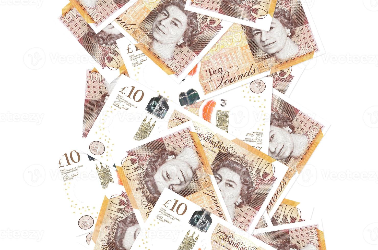 10 brittiskt pounds räkningar flygande ner isolerat på vit. många sedlar faller med vit copy på vänster och rätt sida foto
