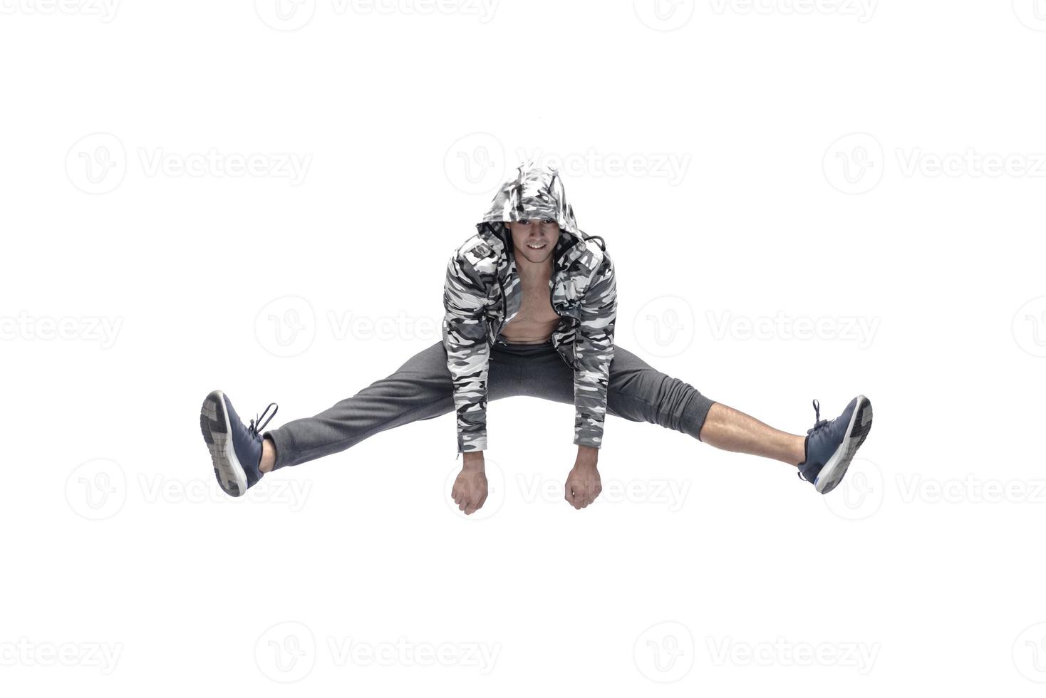 manlig modell håller på med ha sönder dansa rutin. isolerat på vit bakgrund foto