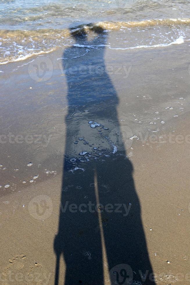 fotografens skugga på de stranden. foto