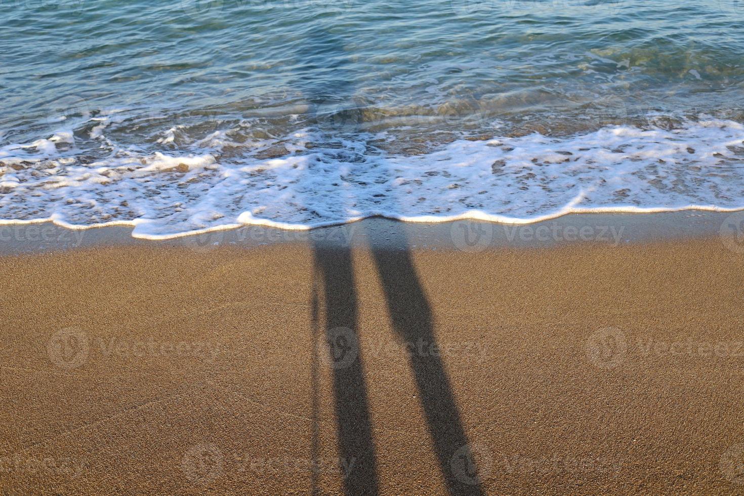 fotografens skugga på de stranden. foto