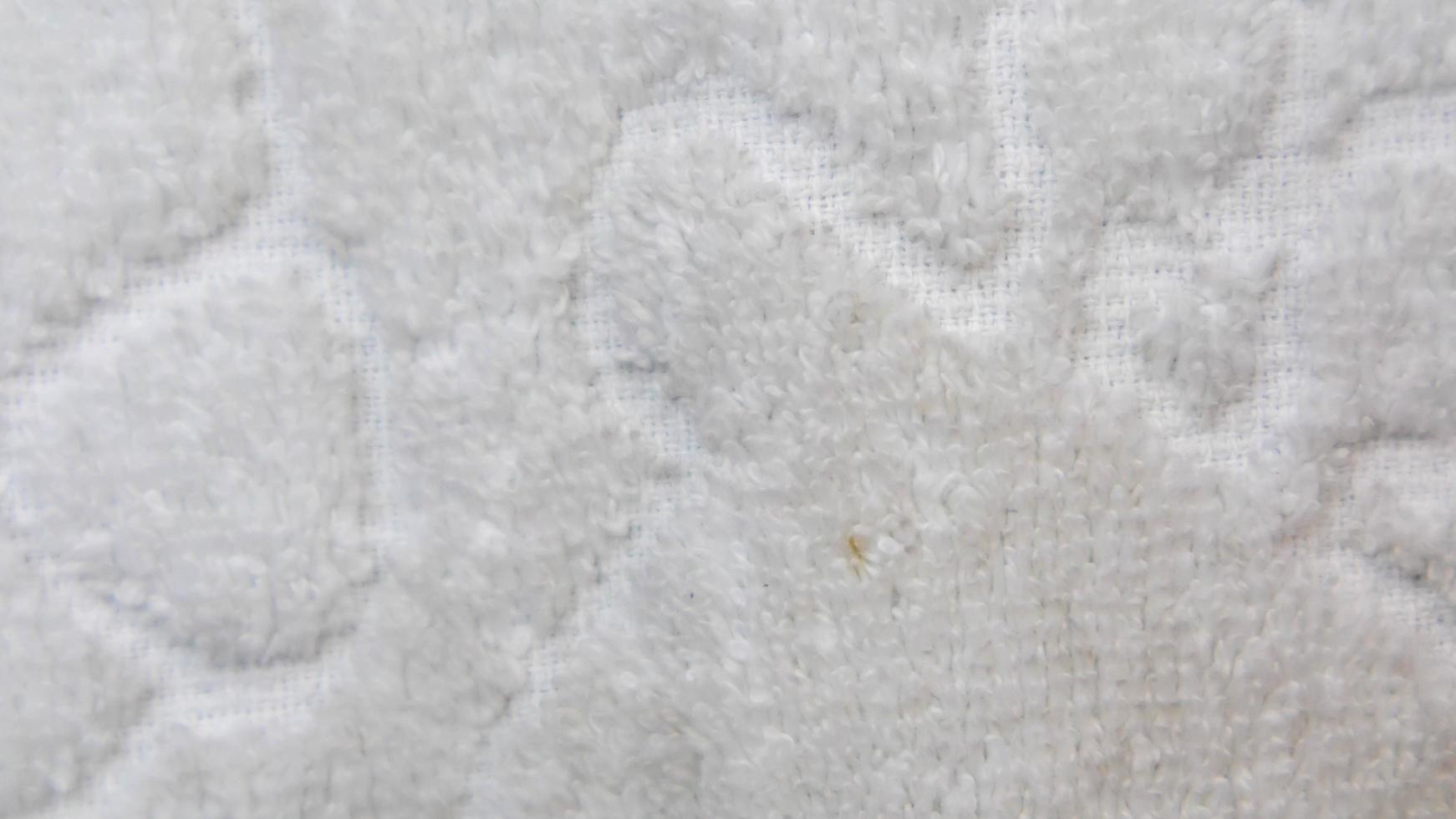 vit handduk textur som de bakgrund foto