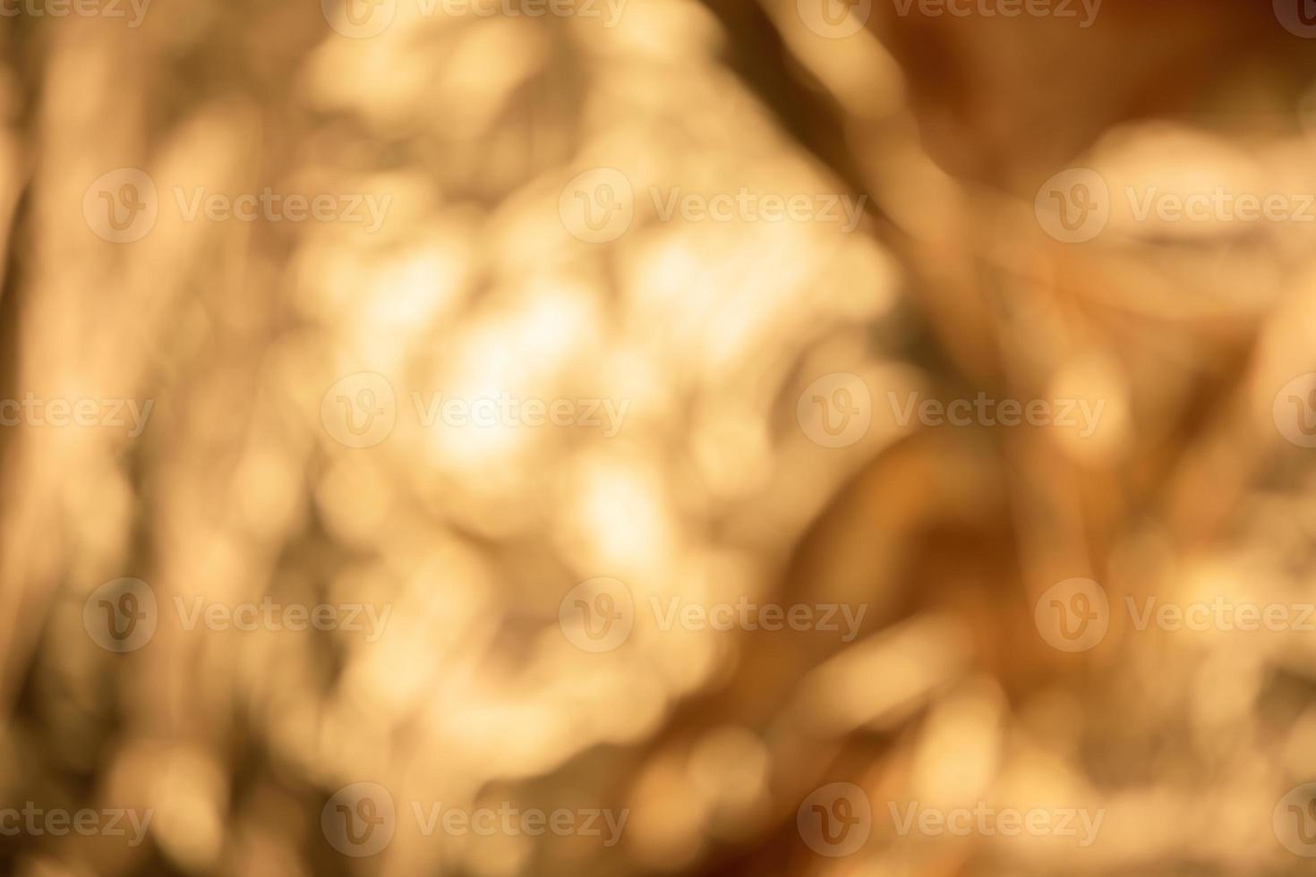 abstrakt ut av fokus gyllene metallisk bakgrund foto