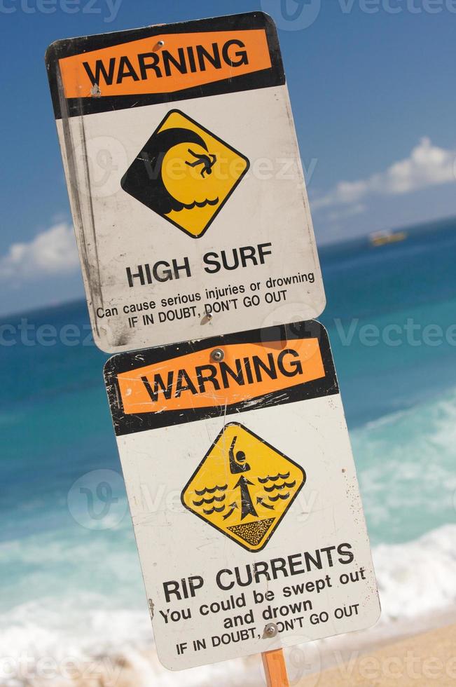 surfa och strömmar varning tecken foto
