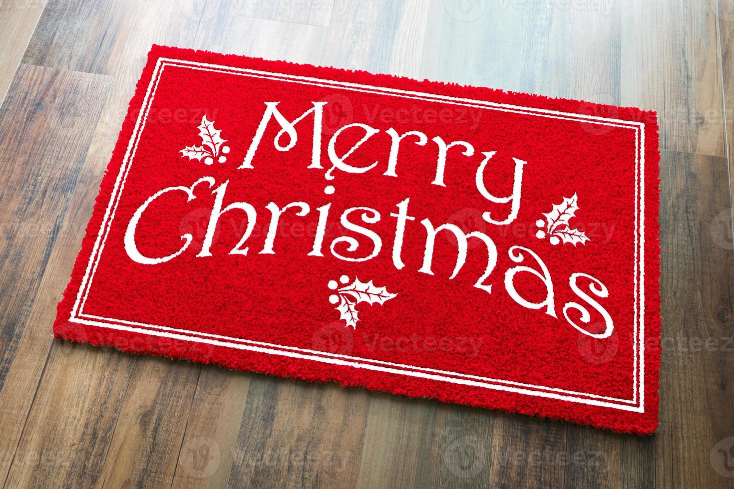 glad jul röd Välkommen matta på trä golv bakgrund foto